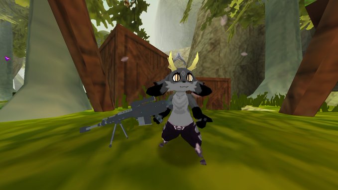 A 3D rendered game scene showing a small, grey horned creature holding a large machine gun, standing on green grass near wooden crates and trees.