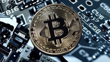 A physical gold-colored Bitcoin coin rests on a dark circuit board, visually representing cryptocurrency markets. The image pairs with ETF flow data showing Bitcoin's largest outflow at -$444.51M, alongside Ethereum (-$12.85M), XRP (+$15.63M), and HYPE (+$1.82M) movements on June 26.
