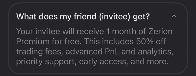 An informational text panel titled 'What does my friend (invitee) get?' explaining that invitees receive 1 month of Zerion Premium for free, including 50% off trading fees, advanced PnL and analytics, priority support, early access, and more.