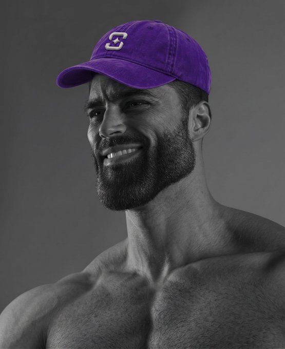 A muscular, bearded man smiles confidently while wearing a purple cap featuring the number "3," symbolizing the pursuit of becoming the number one casino rather than settling for second place—mirroring the post's call for ambitious, top-tier thinking.