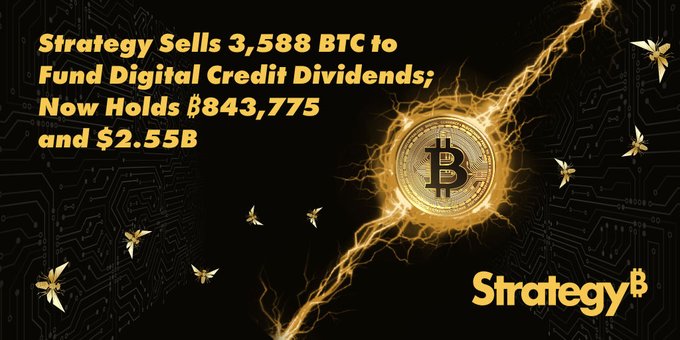 The image features a dramatic Bitcoin coin surrounded by golden electrical effects on a dark circuit-board background, with text announcing "Strategy Sells 3,588 BTC to Fund Digital Credit Dividends; Now Holds 843,775 and $2.55B," reinforcing the breaking news about Strategy's major Bitcoin sale.