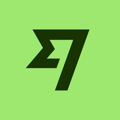 A stylized green logo featuring a black geometric "7" design, which is associated with Wise (formerly TransferWise), the fintech company that plans to resubmit its U.S. trust charter application under the new GENIUS Act framework.