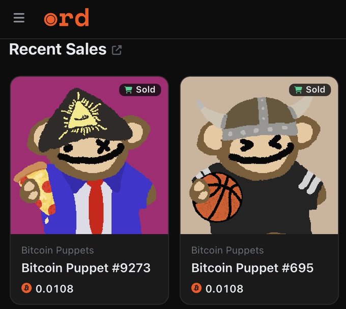 A screenshot of the ord.net homepage displaying "Recent Sales" of two Bitcoin Puppets NFTs—both marked "Sold" at 0.0108 BTC—including Bitcoin Puppet #9273 (a suited character with a pizza) and Bitcoin Puppet #695 (a viking-helmeted figure holding a basketball), illustrating a sample of the Bitcoin Puppets collection available on the ord platform.