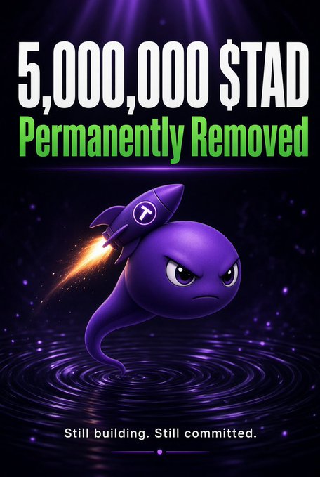Promotional graphic reading '5,000,000 $TAD Permanently Removed' featuring an angry purple ghost-like character with a rocket strapped to its back, and the tagline 'Still building. Still committed.'