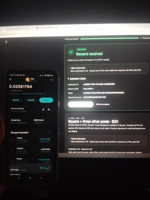A smartphone displaying a Binance wallet with a balance of 0.02581794 BNB sits in front of a laptop screen showing a completed task campaign for a "$20 BNB" reward, with a green "Reward received" notification confirming payment. The post references the campaign shown, where the user has successfully received their $20 BNB reward after completing the task requirements.