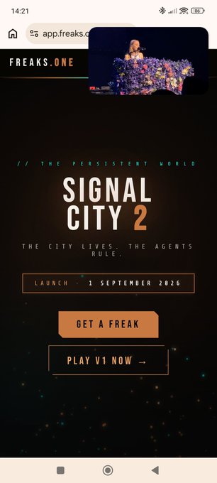 A mobile screenshot of a website for 'FREAKS.ONE' promoting 'SIGNAL CITY 2 // THE PERSISTENT WORLD', with text 'THE CITY LIVES. THE AGENTS RULE.' and buttons for 'GET A FREAK' and 'PLAY V1 NOW'.
