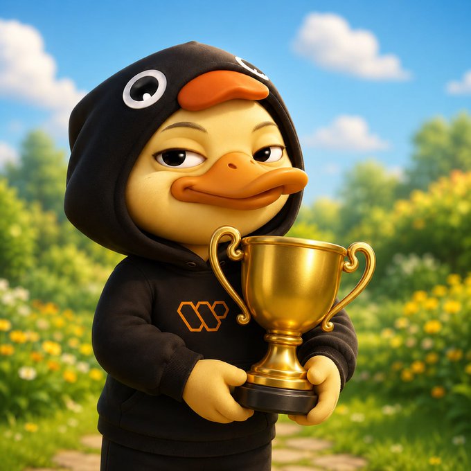 The image features a cartoon duck wearing a black hoodie with an orange logo that says "Wallchain" on it. The duck is holding a gold trophy in its beak, standing against a backdrop of trees and flowers. The caption provided for this image reads, "What I find fascinating about @wallchain is its capacity to transform the perspective on content creation. Most platforms emphasize activity above all else. The more often you post, the higher visibility you attain."