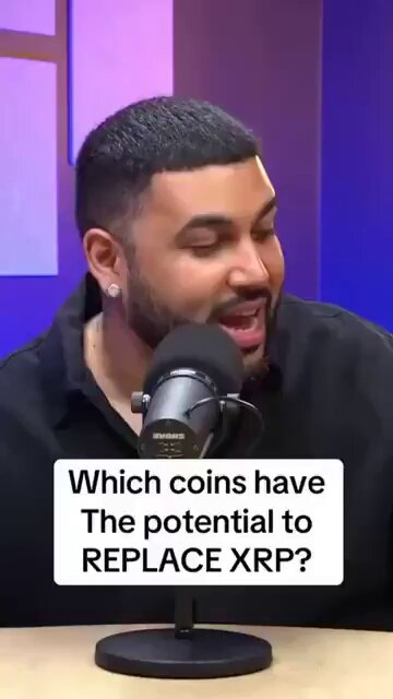 The image shows a man sitting at a microphone, with a sign above him that reads "Which coins have the potential to Replace XRP?". This suggests that there might be a discussion or comparison between different types of digital currency, such as Bitcoin and XRP. The presence of the sign indicates that this is an intentional focus on the topic being discussed in the image.