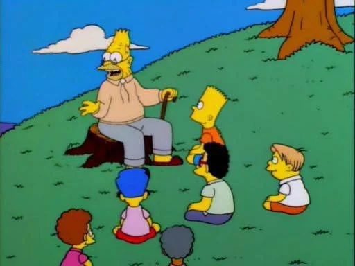 An animated scene from The Simpsons showing Grampa Simpson telling a story to Bart, Lisa, and other children while sitting on a tree stump on a grassy hill.