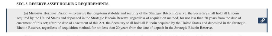 The image shows a long, rectangular piece of paper with text written on it. The text appears to be from the United States government or an organization within the U.S., discussing reserve requirements for Bitcoins. The document seems to be related to the American Reserve Modernization Act (ARMA) and its provisions concerning the sale of acquired Bitcoins.