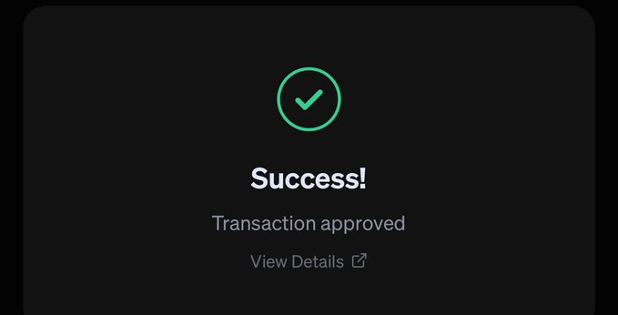 A dark-themed success confirmation screen displays a green checkmark with the text "Success! Transaction approved" along with a "View Details" link, indicating a completed transaction. This confirmation screen verifies that the purchase of an additional 100x boost for the $GREENBULL token was successfully processed.