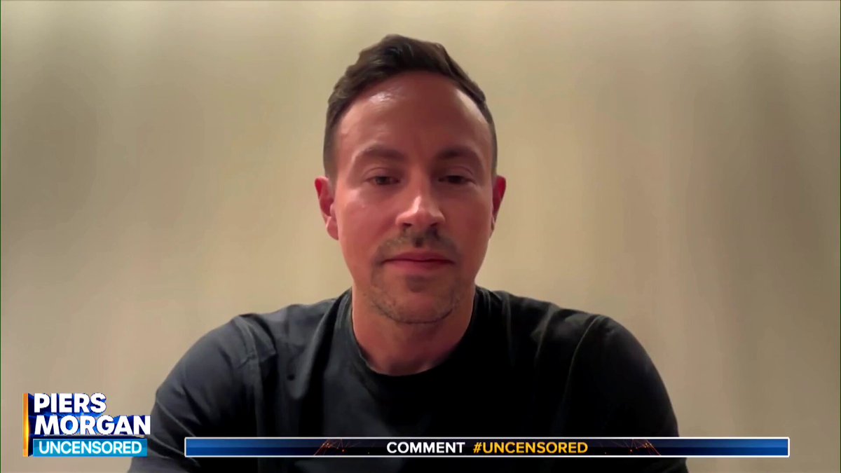 The image shows a man wearing a black shirt, sitting down with his head tilted back as if deep in thought or contemplation. The caption below the image reads "Focus on what is in the image and how it relates to the post". This suggests that the image might be related to a discussion about the potential takeover of eBay by GameStop, which has been widely speculated due to GameStop's recent success against the Winklevoss twins.