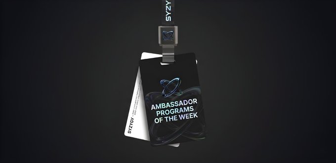 An ID badge on a lanyard reading 'SYZY' displays 'AMBASSADOR PROGRAMS OF THE WEEK' against a black background.