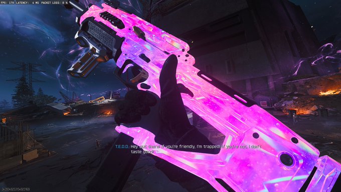 A first-person view in Call of Duty Warzone shows the player holding a vibrant pink and purple "cherry fizz" camouflaged VMP submachine gun, while a glowing enemy labeled "T.E.D.D." taunts, "Hey Mr. Giraffe, if you're friendly, I'm trapped all you're not, I don't taste good!!"