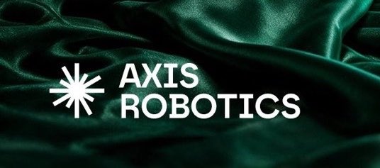 The image features a dark, silky green fabric backdrop with the "AXIS ROBOTICS" logo and a white starburst emblem prominently displayed. This aligns with the post announcing that a robotics project is live on @axisrobotics, suggesting the image is a promotional graphic for the brand.