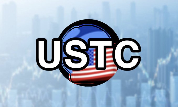 A logo featuring the text "USTC" overlaid on a circular emblem containing the American flag, set against a blurred cityscape background, visually representing the TerraClassicUSD cryptocurrency discussed in the post about its volatile trading patterns.