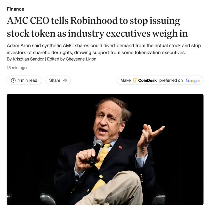 A CoinDesk Finance article titled "AMC CEO tells Robinhood to stop issuing stock token as industry executives weigh in" featuring a photo of AMC CEO Adam Aron speaking into a microphone, reporting that Adam Aron urged Robinhood to halt synthetic AMC share tokens citing concerns they could divert demand from actual stock and strip investors of shareholder rights.
