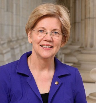 Senator Elizabeth Warren, pictured in a purple blazer with a U.S. Senate lapel pin, is shown in an official portrait likely taken at the U.S. Capitol, as she publicly demands accountability from the Commerce Department regarding changes to inflation data methodology.