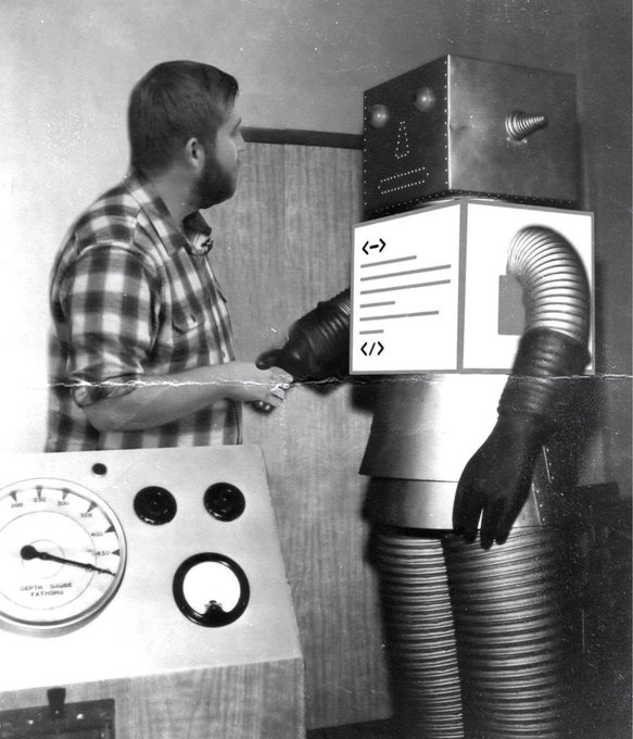 A black-and-white photo showing a bearded man in a plaid shirt standing face-to-face with a robot featuring a boxy head, flexible corrugated tubes for arms, and control panels with dials and gauges nearby.