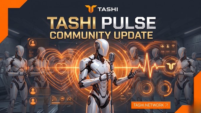 A futuristic promotional graphic for the "TASHI PULSE COMMUNITY UPDATE" features a white humanoid robot holding a microphone in front of a glowing orange heart with a heartbeat line, alongside the text "TASHI NETWORK" and the Tashi logo, visually announcing the live community event hosted by CEO AmarSBedi.
