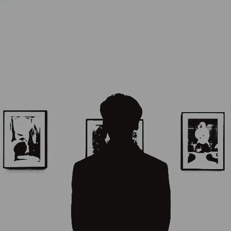 A minimalist grayscale illustration of a silhouetted person viewed from behind, looking at three framed abstract artworks displayed on a wall.