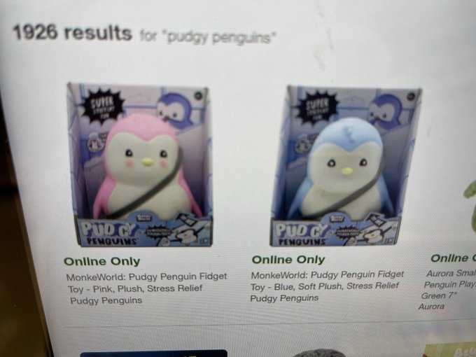 A screen showing search results for 'pudgy penguins' displays 1926 results, featuring 'MonkeWorld: Pudgy Penguin Fidget Toy' listings in pink and blue plush varieties, marked as 'Online Only'.