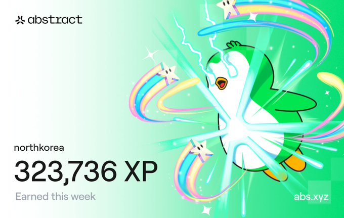 The image features an abstract advertisement for a bakery with a penguin character that appears to be crying out of a cloud of smoke, surrounded by colorful stars. The text in the image reads "North Korea 33,737 XP this week" and "Happy XP Day! Week 69 XP: 323,736 Bakery made it much easier to stack a solid amount of XP this week @AbstractChain".