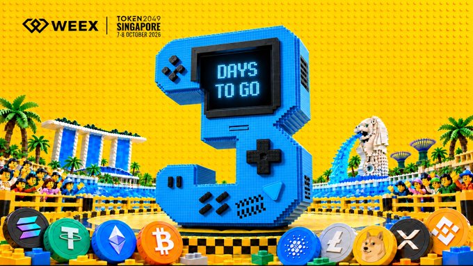 A vibrant yellow promotional banner for TOKEN2049 Singapore (7-8 October 2025) and WEEK, featuring a large blue handheld gaming device displaying 'DAYS TO GO' above cryptocurrency tokens.