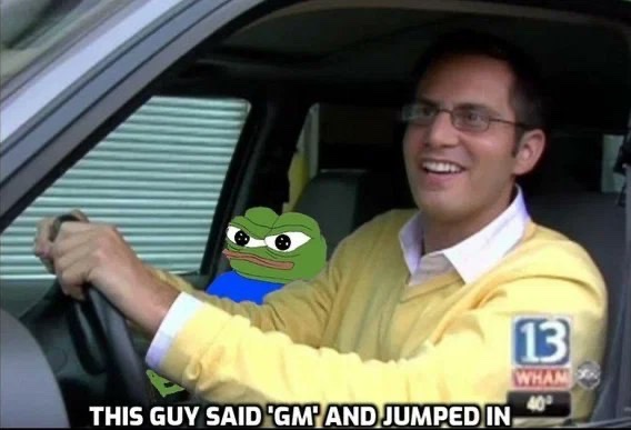 A news broadcast screenshot showing a smiling man in a yellow sweater and glasses driving a car, with text reading 'THIS GUY SAID 'GM' AND JUMPED IN' and the news station '13 WHAM' logo visible.