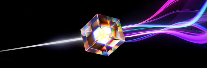 A vibrant digital artwork of a glowing multicolored crystal cube with rainbow light trails streaming horizontally against a black background.