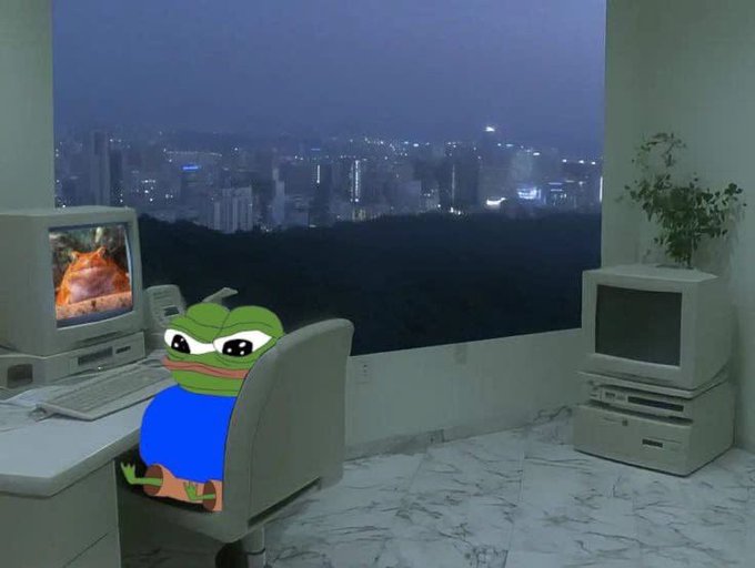 An edited image shows the Pepe the Frog meme character sitting at a vintage computer setup on an office desk, overlooking a hazy cityscape at dusk with an old TV in the corner.