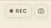 A glossy 3D-styled "REC" record button with a pill-shaped design, featuring a red recording dot on the left and a camera-style icon on the right, set against a cream background with a vertical dashed line.

The image showcases a stylized recording button graphic, likely used as a design element or icon to represent video recording functionality.