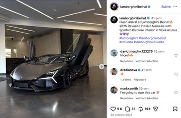 An Instagram post by Lamborghini Beirut (@lamborghini.beirut) dated April 1 announces the fresh arrival of a Lamborghini Revuelto in their showroom, with the caption "Fresh arrival at Lamborghini Beirut! 🚗 2023 Revuelto in Nero Nemesis with Sportivo Bicolore Interior in Viola Acutus 💜💜💜 #lamborghini #lamborghinibeirut #revuelto #lamborghinirevuelto." The image shows a sleek gray Revuelto sports car with its signature scissor doors open, displayed in the showroom, reflecting the user's "New whip thanks Ethereum" post—suggesting they purchased the luxury vehicle with cryptocurrency.