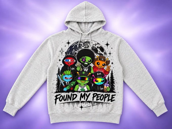 A gray hoodie features colorful cartoon characters including an alien, a bear, and a cat with a USA flag, along with the text "FOUND MY PEOPLE" against a purple background.