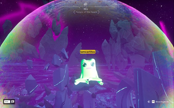 Video game screenshot showing a glowing green frog character labeled 'iamcarlitos' in the 'Temple of the Spark' area with a vibrant purple cosmic background.