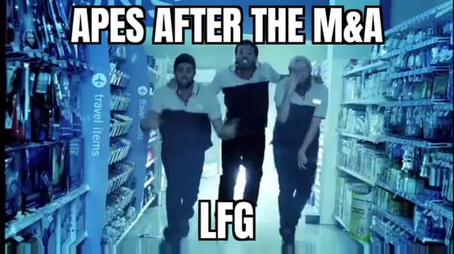 Three employees walk down a convenience store aisle with the text "APES AFTER THE M&A" at the top and "LFG" at the bottom, suggesting excitement and anticipation following a merger and acquisition announcement, reinforced by the 💰 money bag emoji.