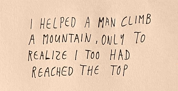 A handwritten note on beige paper reads: 'I HELPED A MAN CLIMB A MOUNTAIN, ONLY TO REALIZE I TOO HAD REACHED THE TOP'.