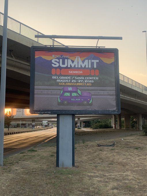 A digital billboard advertises the "Solana Summit Serbia" event at Belgrade's Sava Center on August 26-27, 2023, featuring Solana branding and a stylized van illustration, fitting the post about attending the event.