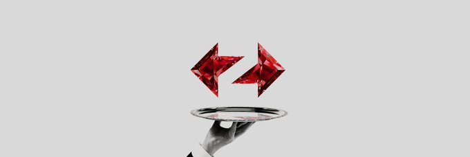 The image features a hand holding a silver tray with two red diamonds, one pointing upwards and the other downwards. The background of the image is white, which contrasts with the vibrant red diamonds. The text "Focus on what is in the image and how it relates to the post" suggests that the focus should be on the hand and the tray rather than the content of the image itself.