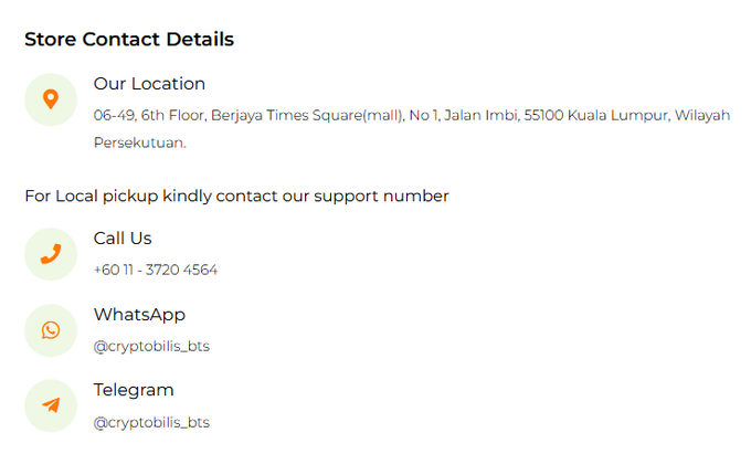 This image displays the store contact details for Cryptobilis, a Southeast Asian Web3 and crypto-commerce store based in Malaysia. It lists their physical location at Berjaya Times Square in Kuala Lumpur, along with contact information including a phone number (+60 11 - 3720 4564), WhatsApp (@cryptobilis_bts), and Telegram (@cryptobilis_bts) for local pickup support.