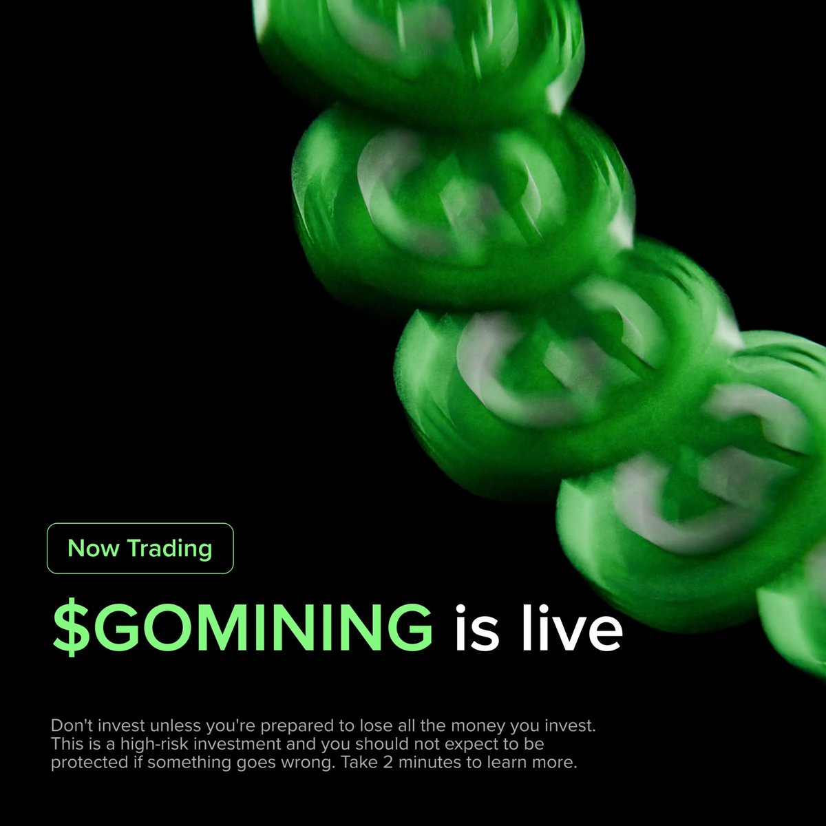A promotional graphic featuring glossy green spheres on a black background announces "$GOMINING is live," with a "Now Trading" badge and a risk warning advising investors not to invest unless prepared to lose all the money they invest.