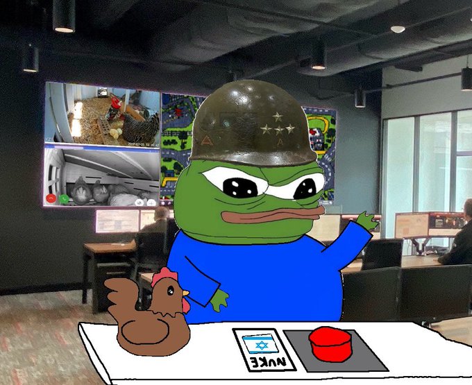 A Pepe the Frog meme wearing a military helmet stands in an office setting with a chicken, an Israeli flag labeled 'NUKE', and a red button on the table in front of him.