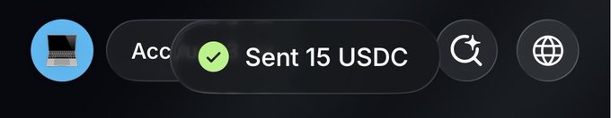 The image displays a transaction confirmation pop-up with a green checkmark, showing "Sent 15 USDC" alongside a laptop icon and a refresh button. This visually confirms the $15 USDC cryptocurrency transfer mentioned in the accompanying post.
