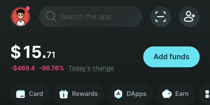 A screenshot of a financial app showing a balance of '$15.71' with a 'Today's change' of '-$469.4 -96.76%,' featuring a red profile icon, search bar, 'Add funds' button, and navigation tabs for Card, Rewards, DApps, and Earn.