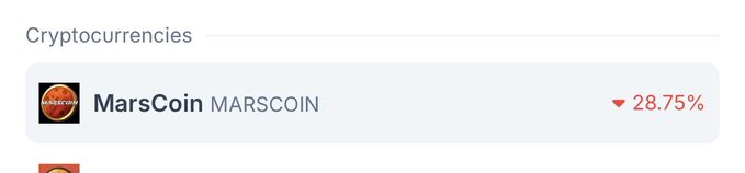 A cryptocurrency tracking screen displays MarsCoin (MARSCOIN) showing a significant decline of 28.75% indicated by a red downward arrow.