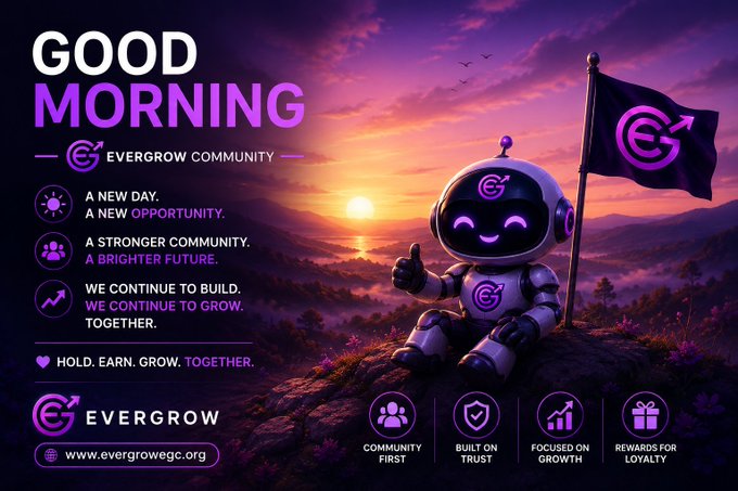 The image features a purple robot sitting on top of a hill with a flag flying from its arm. The backdrop of the scene is a beautiful sunset, creating a serene atmosphere. The text "Good Morning" is written above the robot's head, while the phrase "EVERGrow! Our time to shine is not quite upon us yet, but that time will come." is written below the robot. The image also includes a logo for EverGrow and a website address, which reads "www.evergrow.org".
