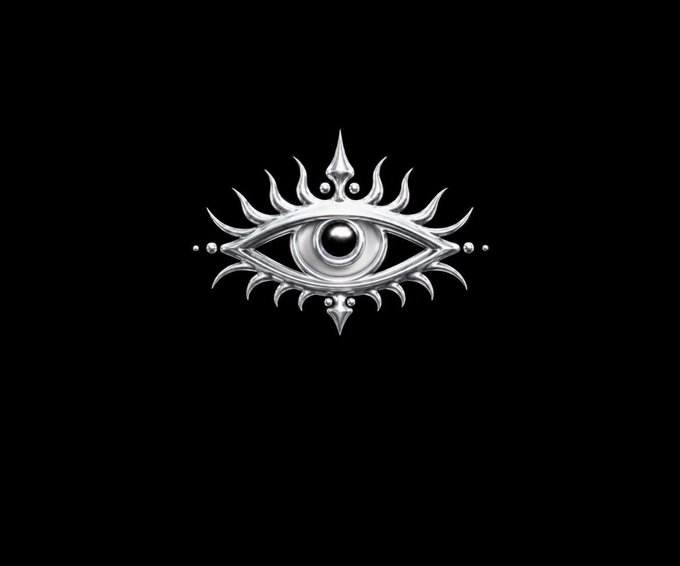 A silver metallic emblem of an eye with sunburst-like rays on a solid black background.