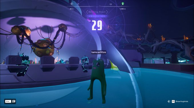 The image shows a character named @It'safwog standing next to a robot, both of them facing each other. The character has a green suit while the robot has a purple one. They are located near a large machine with a clock on its side and numbers 29 written in white letters above it. A caption below the image reads "This @itsafwog is celebrating reached level 29 on the Bealching Beast on the @OthersideMeta #Fwog Good." The post also mentions that the character has been grinding for 29 hours, which adds context to the scene and emphasizes the importance of the character's achievement.