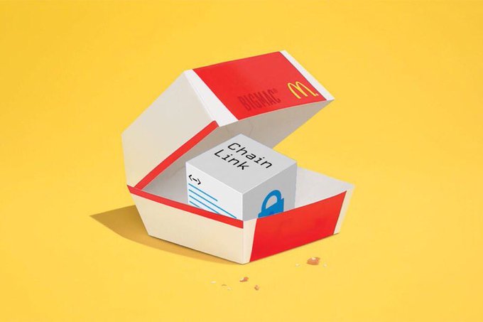 A 3D illustration shows a stylized McDonald's happy meal box containing a white cube labeled 'Chain Link' with a blue padlock icon, set against a yellow background.