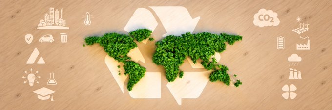 A conceptual image showing a world map made of green foliage inside a recycling symbol on wood, surrounded by icons representing sustainability topics like CO2 emissions, industry, and education.